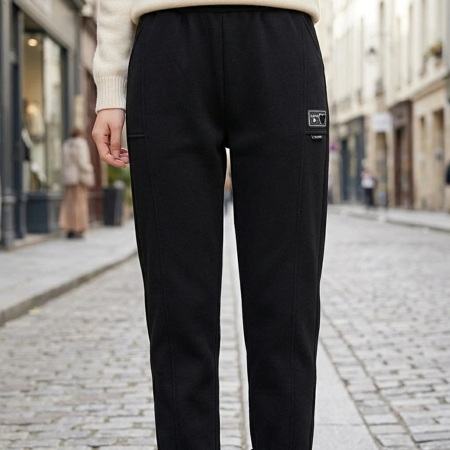 [Pague 2, Leve 4] Calça Love Feminina em Malha Texturizada e Forro Peluciado de Cintura Alta com Costura Frontal Alongadora e Bolsos Funcionais