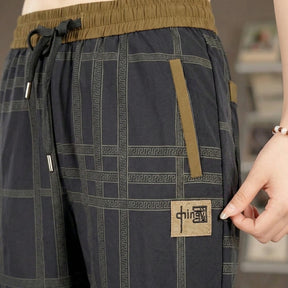 [Leve 4, Pague Só 2!] Calça Capri Maya Feminina em Poliéster e Elastano de Caimento Fluido com Cós Ajustável e Bolsos Contrastantes