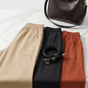 [Compre 2 e Leve 3] Saia-Calça Elori Feminina em Poliéster, Viscose e Elastano Pantacourt de Cintura Alta com Sobreposição Frontal e Cós Elástico + BRINDES