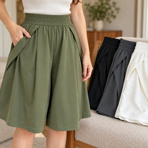 [Compre 2, Leve 4] Bermuda Elina Feminina em Poliéster, Viscose e Elastano de Cintura Alta com Modelagem Evasê, Efeito Saia, Cós Elástico e Bolsos Laterais + BRINDES