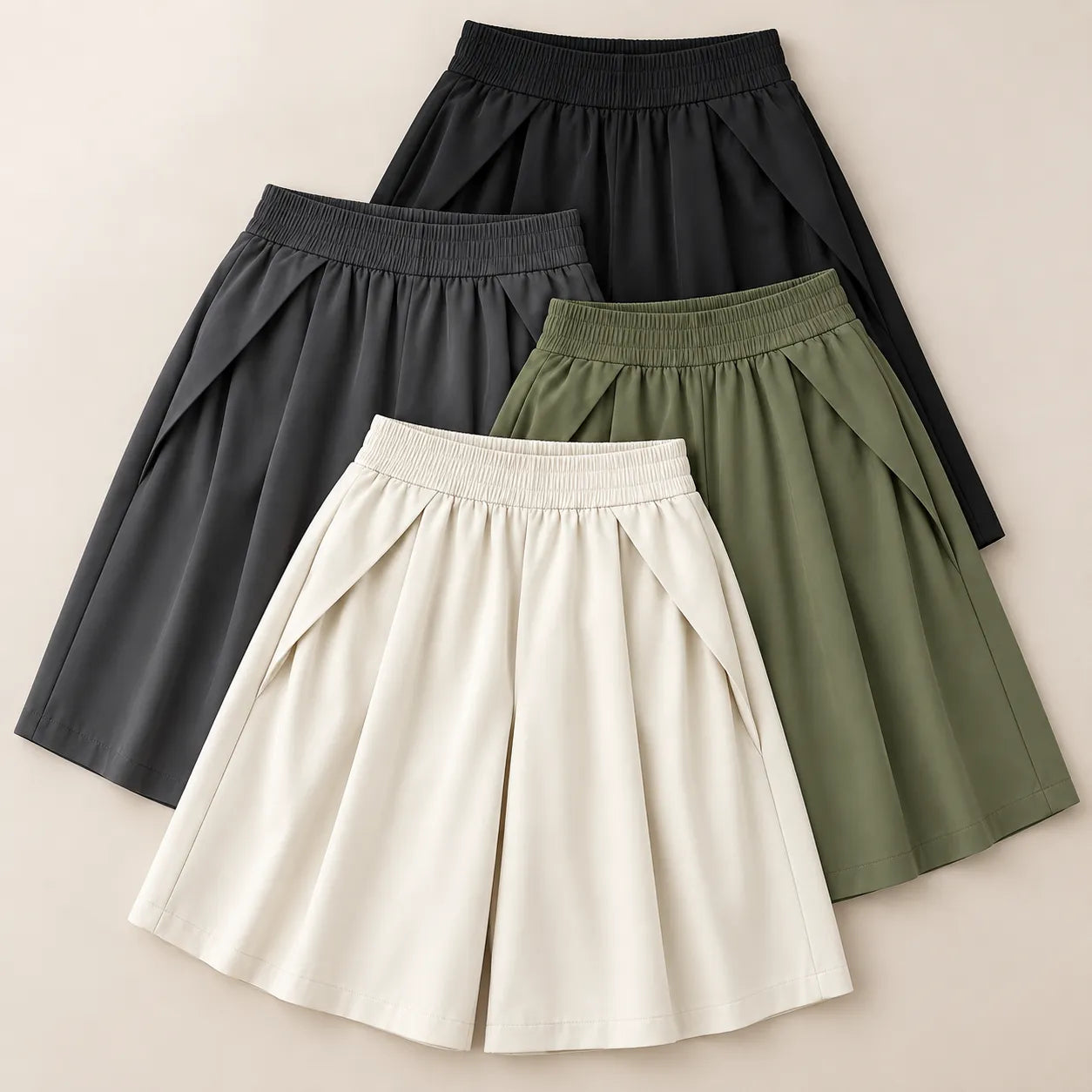 [Compre 2, Leve 4] Bermuda Elina Feminina em Poliéster, Viscose e Elastano de Cintura Alta com Modelagem Evasê, Efeito Saia, Cós Elástico e Bolsos Laterais + BRINDES